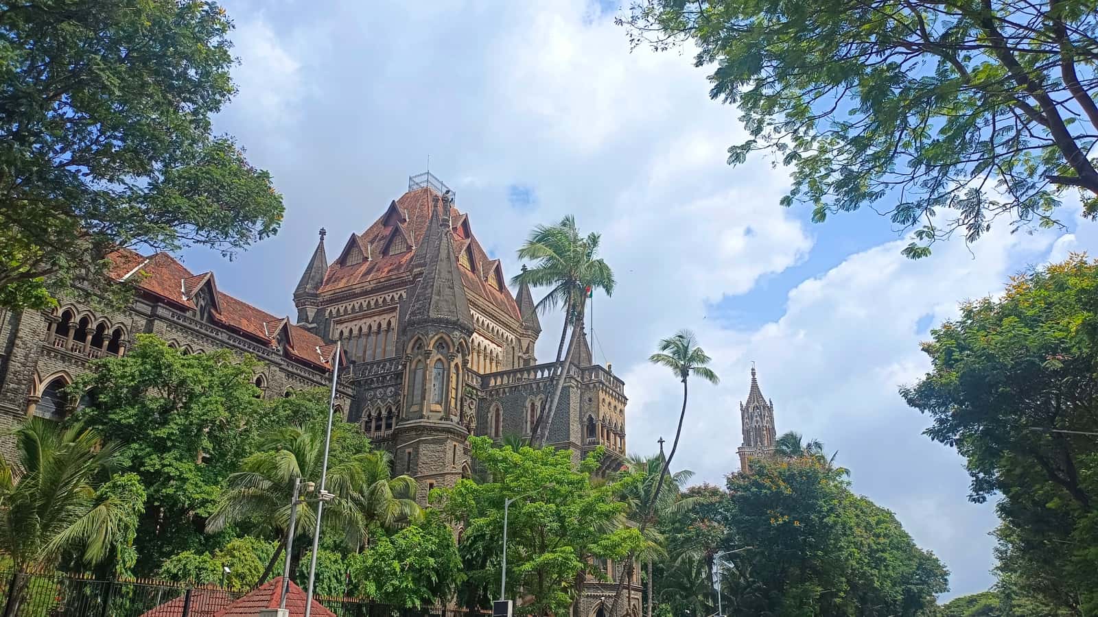 Gothic towers of the Bombay High Court among trees