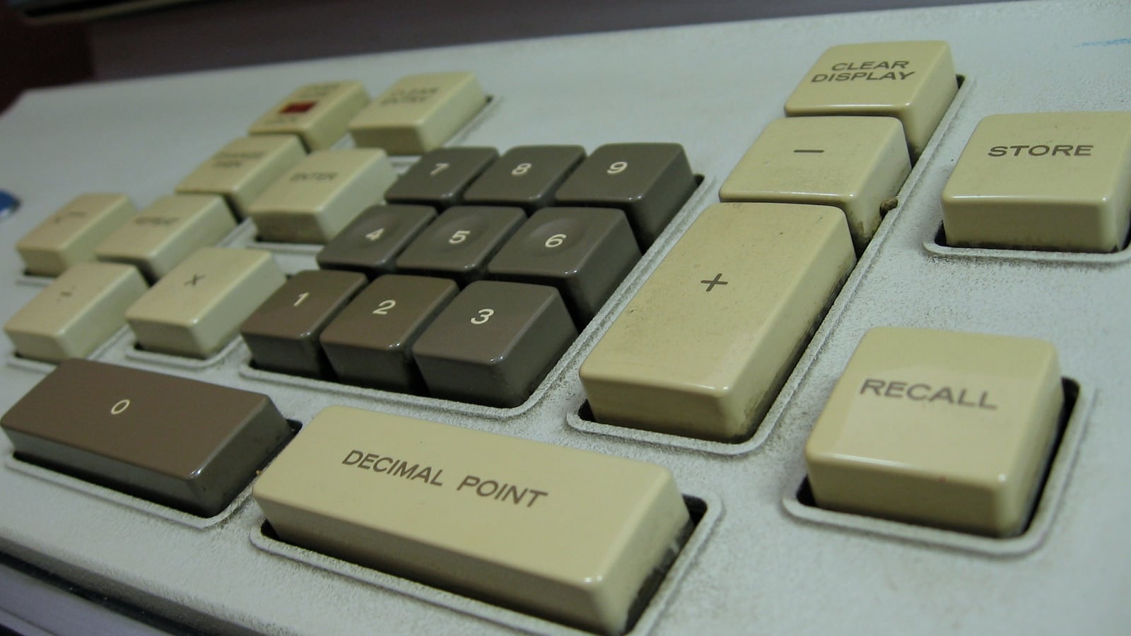 Keys of an old desk calculator, shallow focus